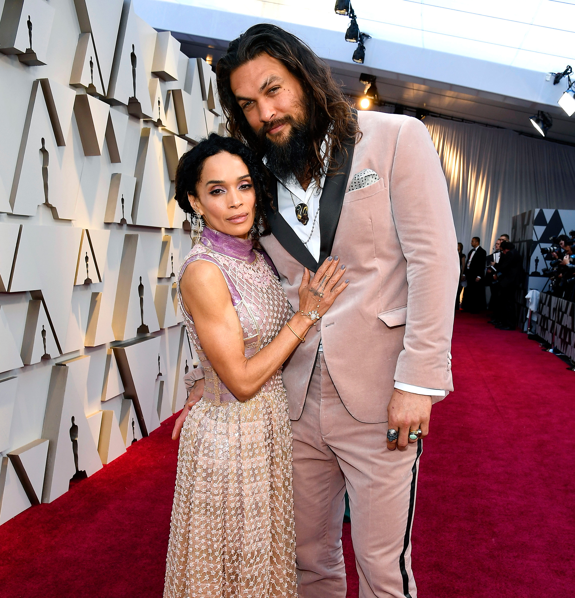   While Jason Momoa looks absolutely KILLER in his blush, velvet suit and matching scrunchie…LOOK AT HIS WIFE. That beaded overlay and lavender silk peeking out is an insane combo. I would also kill for her arms, but that’s for a different post ;)  