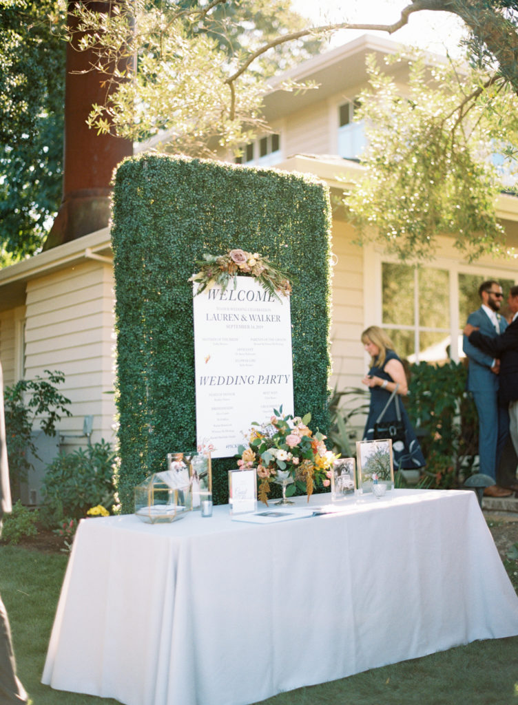 welcome table at a private estate garden wedding in Napa valley